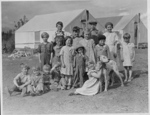 Colony kids in a tent camp. Photograph by Willis T. Geisman for the A.R.R.C. [ASL-PCA-303, Mary Nan Gamble Collection, Alaska State Library]